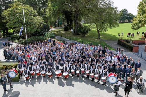 Pipe Band outside of Strowan House celebrating 100 years since the band’s formation