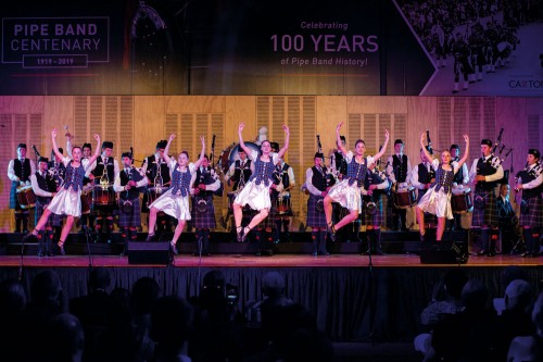 Pipe Band and Highland Dancers at Centenary celebration concert