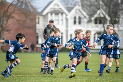 Students playing rugby