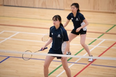 Students playing badminton