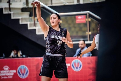 Karereatua is photographed playing Basketball in her New Zealand Representative uniform during one of the teams' games.