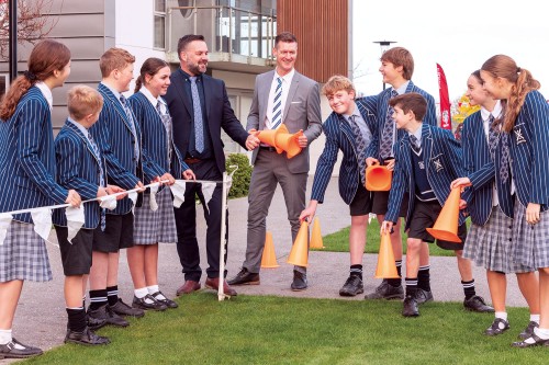 New Assistant Head of Boarding, Struan George (centre), with Director of Boarding, Matt Parr, and a group of boarders.