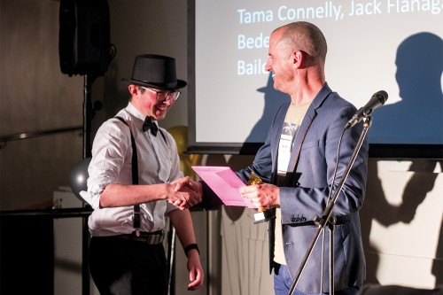 Bede Miller accepting his award at Film Fest.