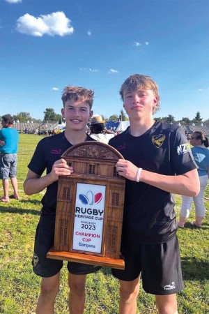 Findley Curtis (Y10 – right) with award from international rugby competition.