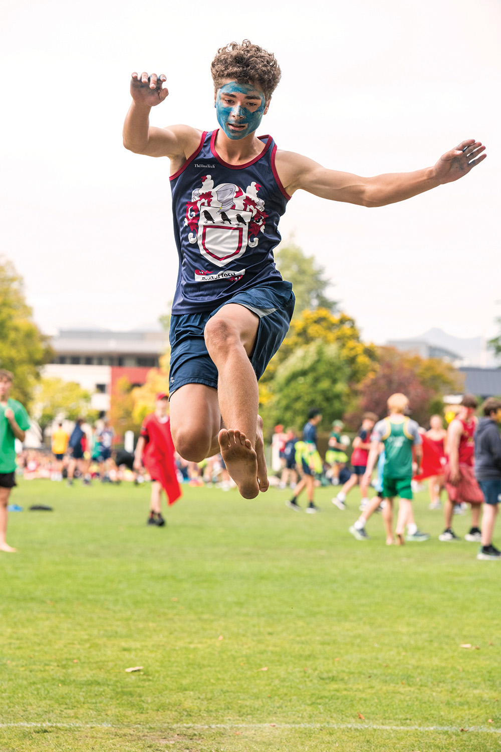 A St Andrew's College student dressed in Rutherford House colours at the annual Athletic Sports Day.