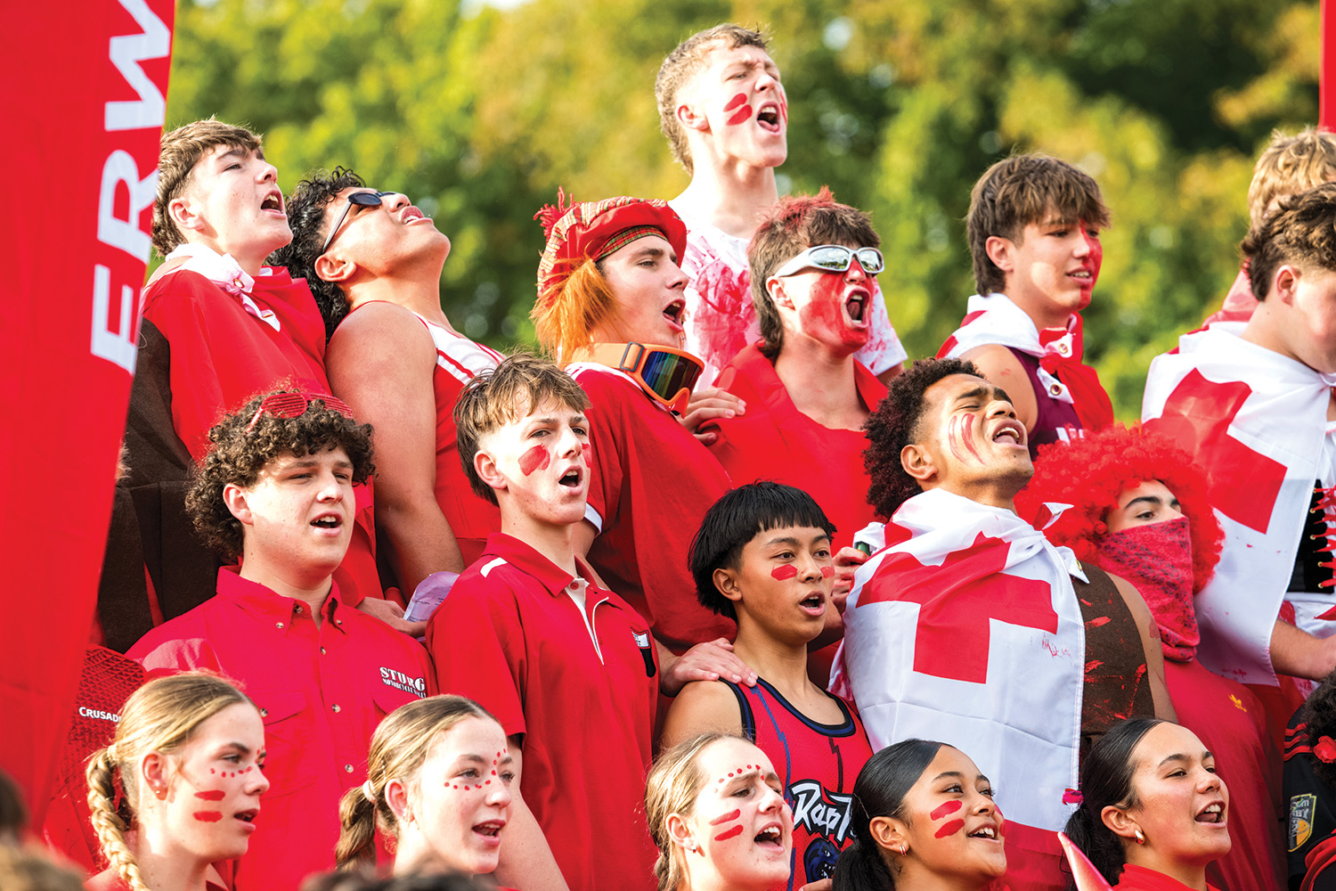 St Andrew's College students cheering for Erwin House at the annual Athletic Sports Day.