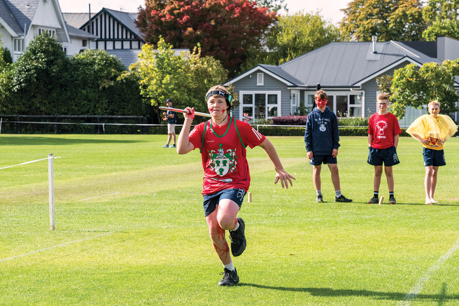 A St Andrew's College student dressed in Erwin House colours at the annual Athletic Sports Day.