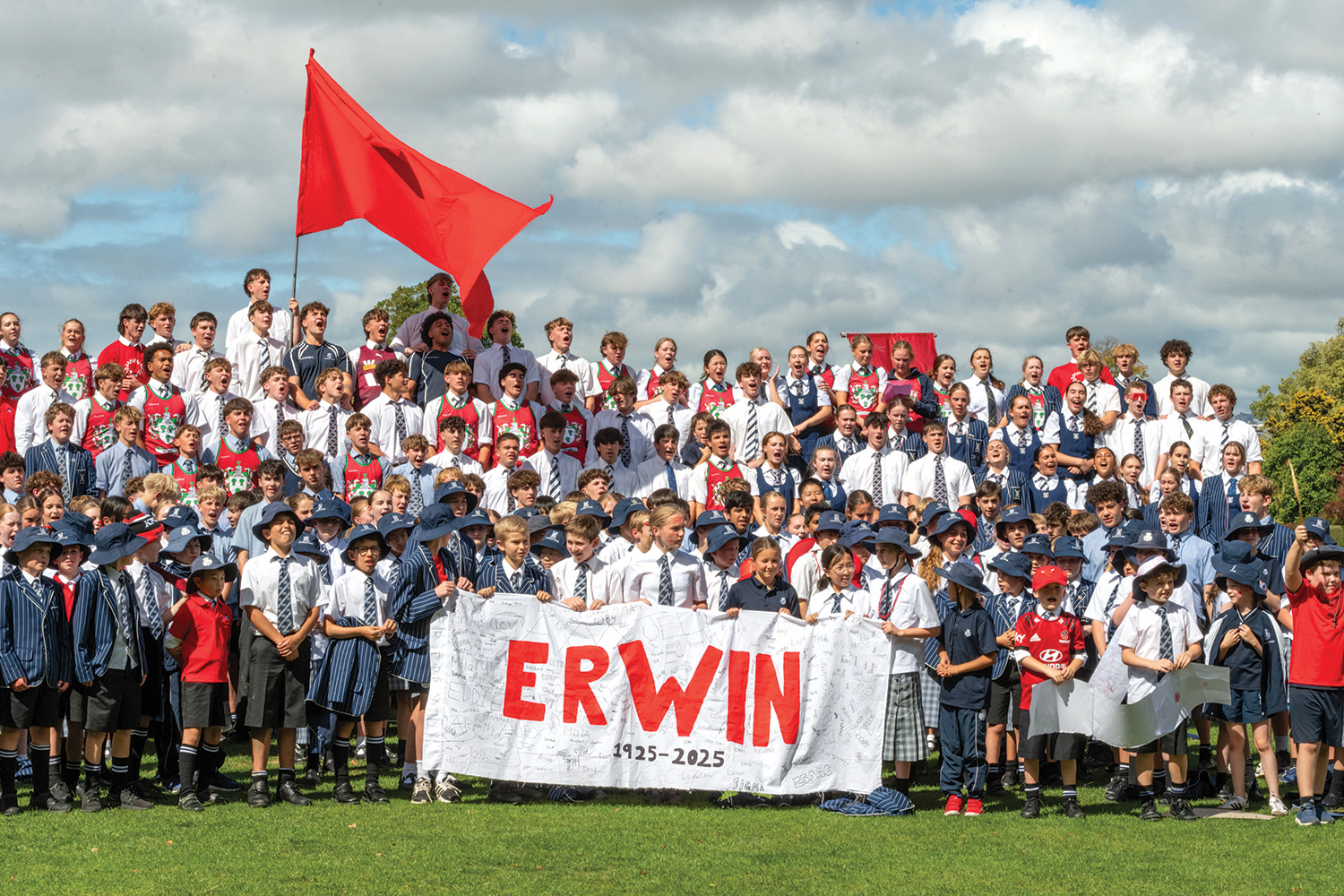 St Andrew's College students cheering for Erwin House at the annual Highland Games.