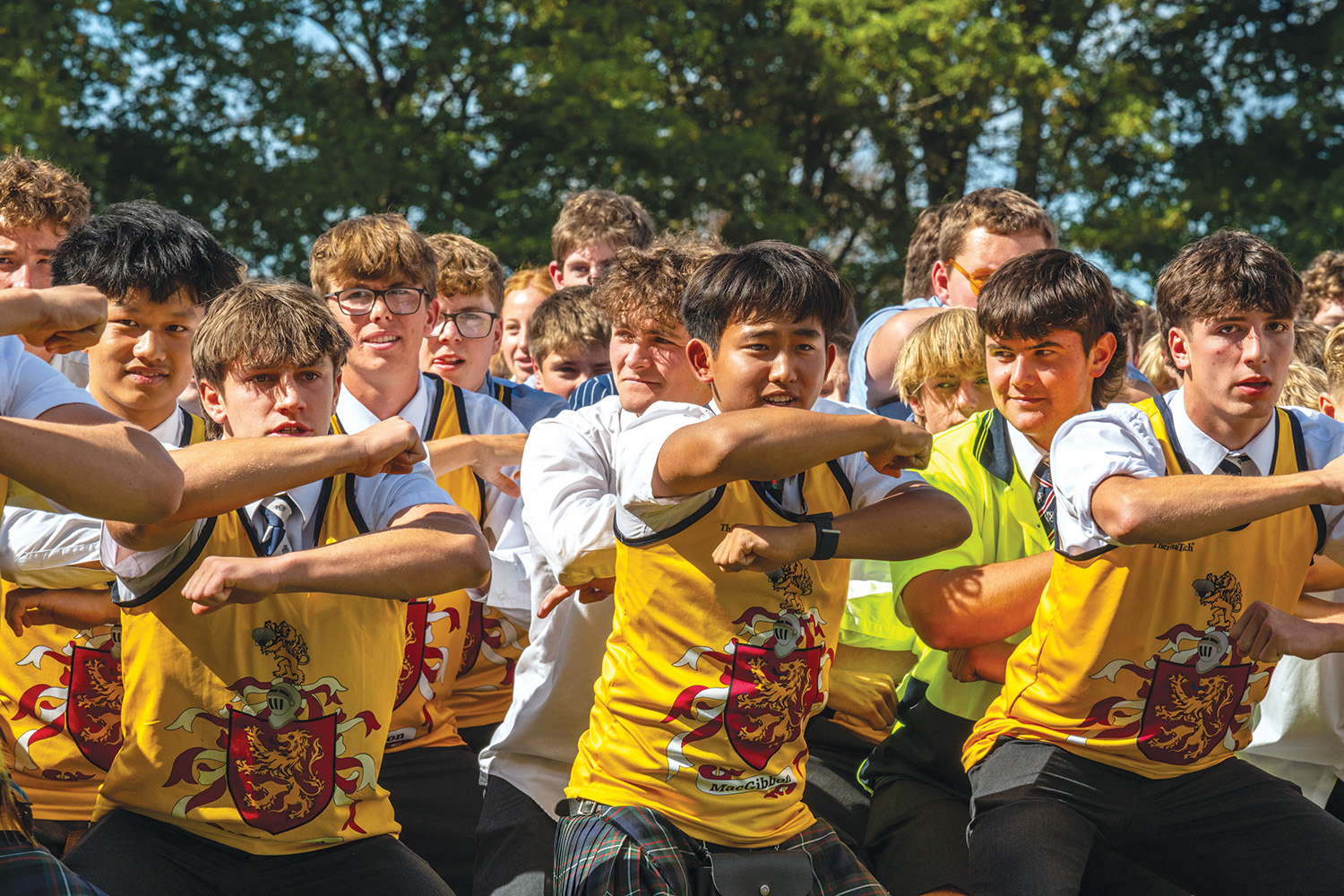 St Andrew's College students dressed in MacGibbon House colours while performing a haka at the annual Highland Games.