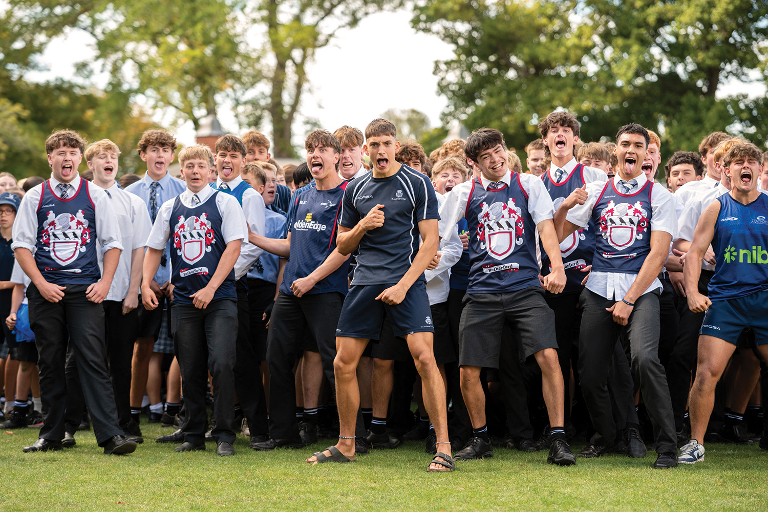 St Andrew's College students doing a haka dressed in Rutherford House colours at the annual Highland Games.