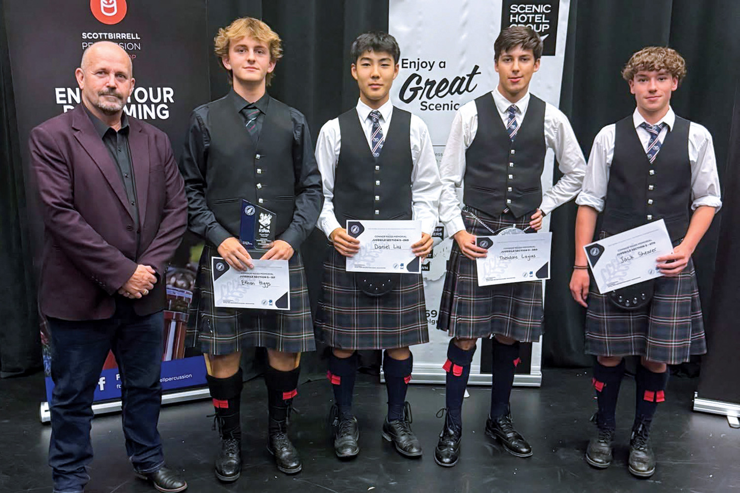 St Andrew's College parent Stephen Higgs, Ethan Higgs, Daniel Liu, Theodore Lagias, Jack Shearer at the Royal New Zealand Pipe Band Association Oceania Solo Drumming Championships.