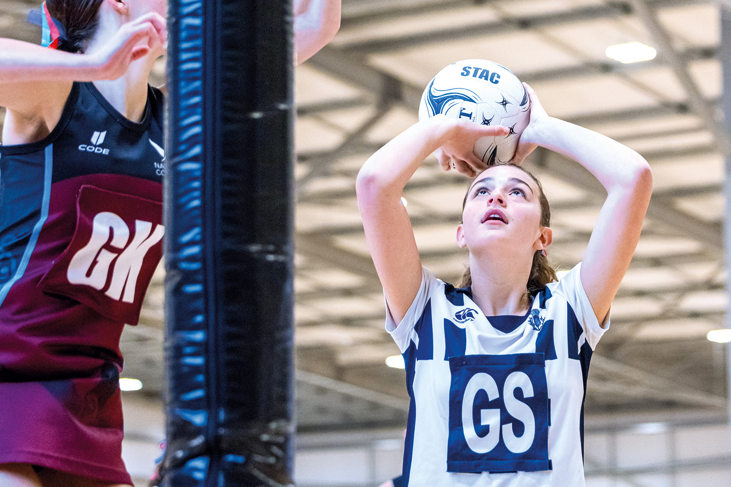 St Andrew's College student Amanda Watkins playing netball.