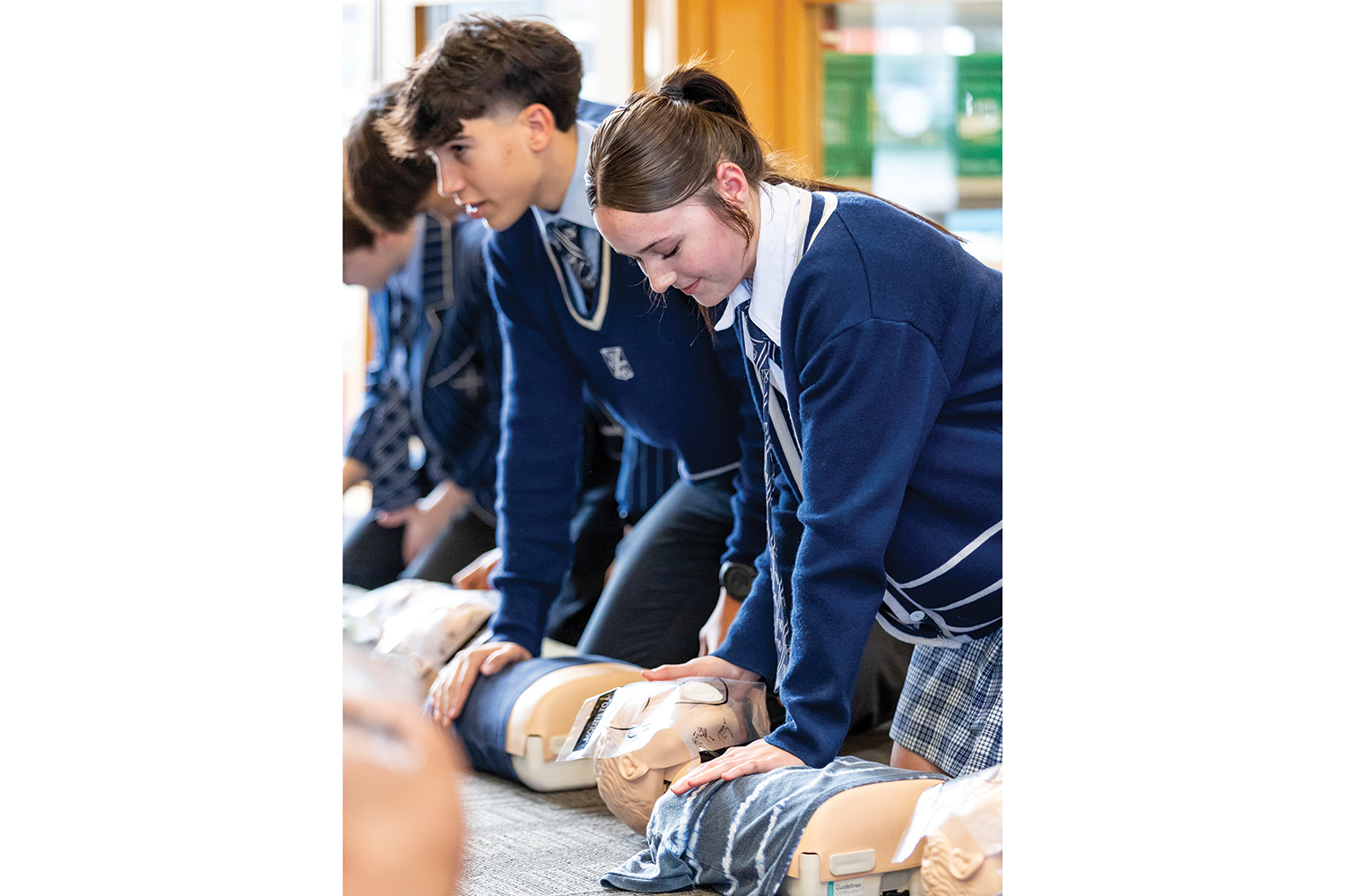 St Andrew's College Year 10 students practising their first aid skills