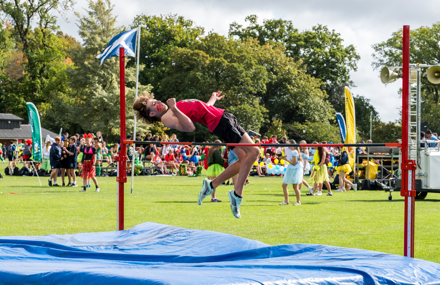 St Andrew's College Secondary School student high jumping at the Athletics Sports Day.