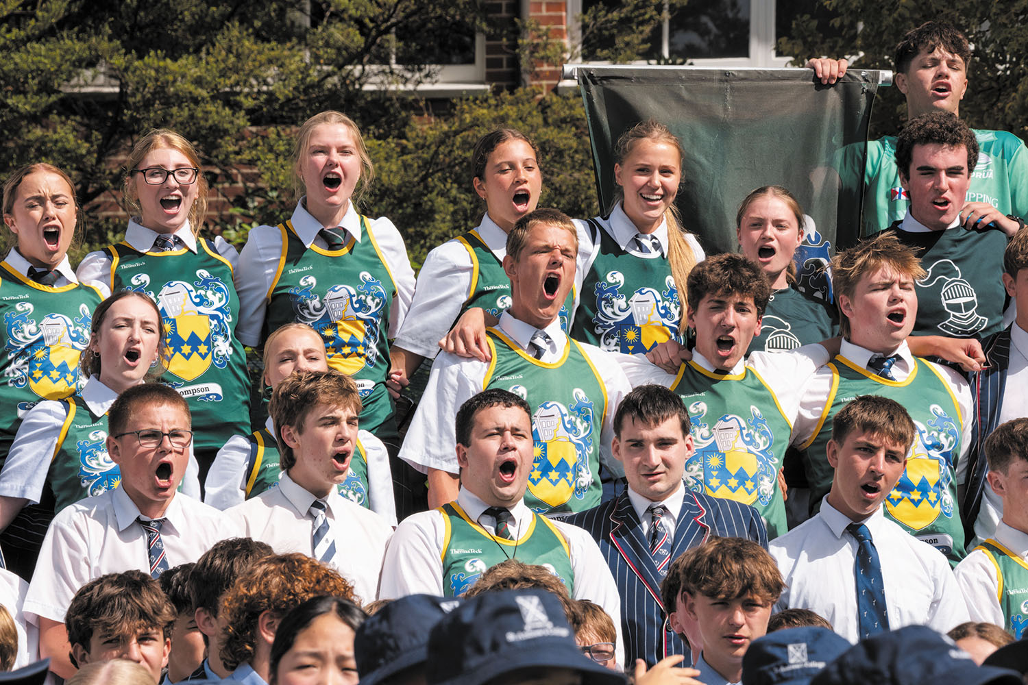 St Andrew's College students chanting the Thompson House chant during the 2025 Highland Games.