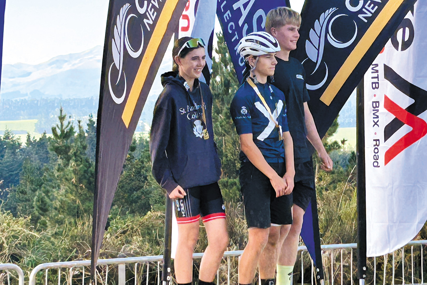 St Andrew's College students Abigail Scott-Douglas (left) and Cooper Pringle (middle), who won gold in the Senior cross country relay at the South Island Secondary Schools’ Mountain Bike Championships.