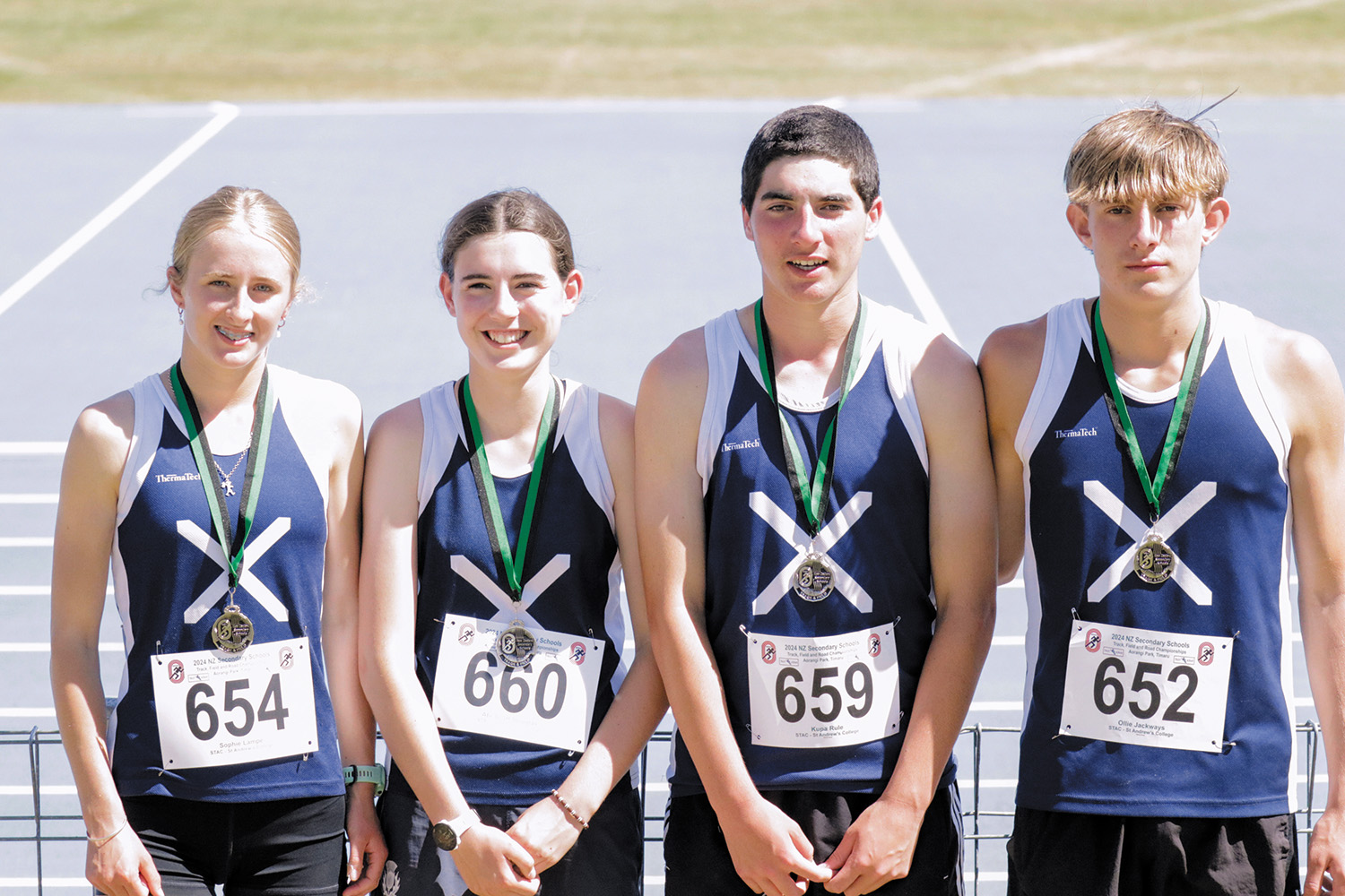 Four St Andrew's College students after winning at the New Zealand Secondary Schools’ Athletics National Track and Field and Road Race Championships