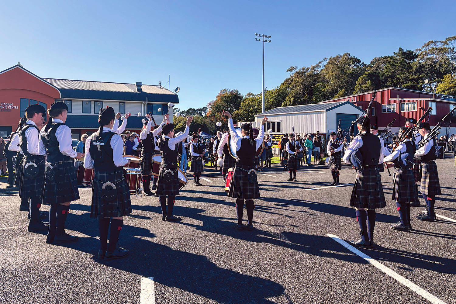 St Andrew's College Pipe Band members performing.