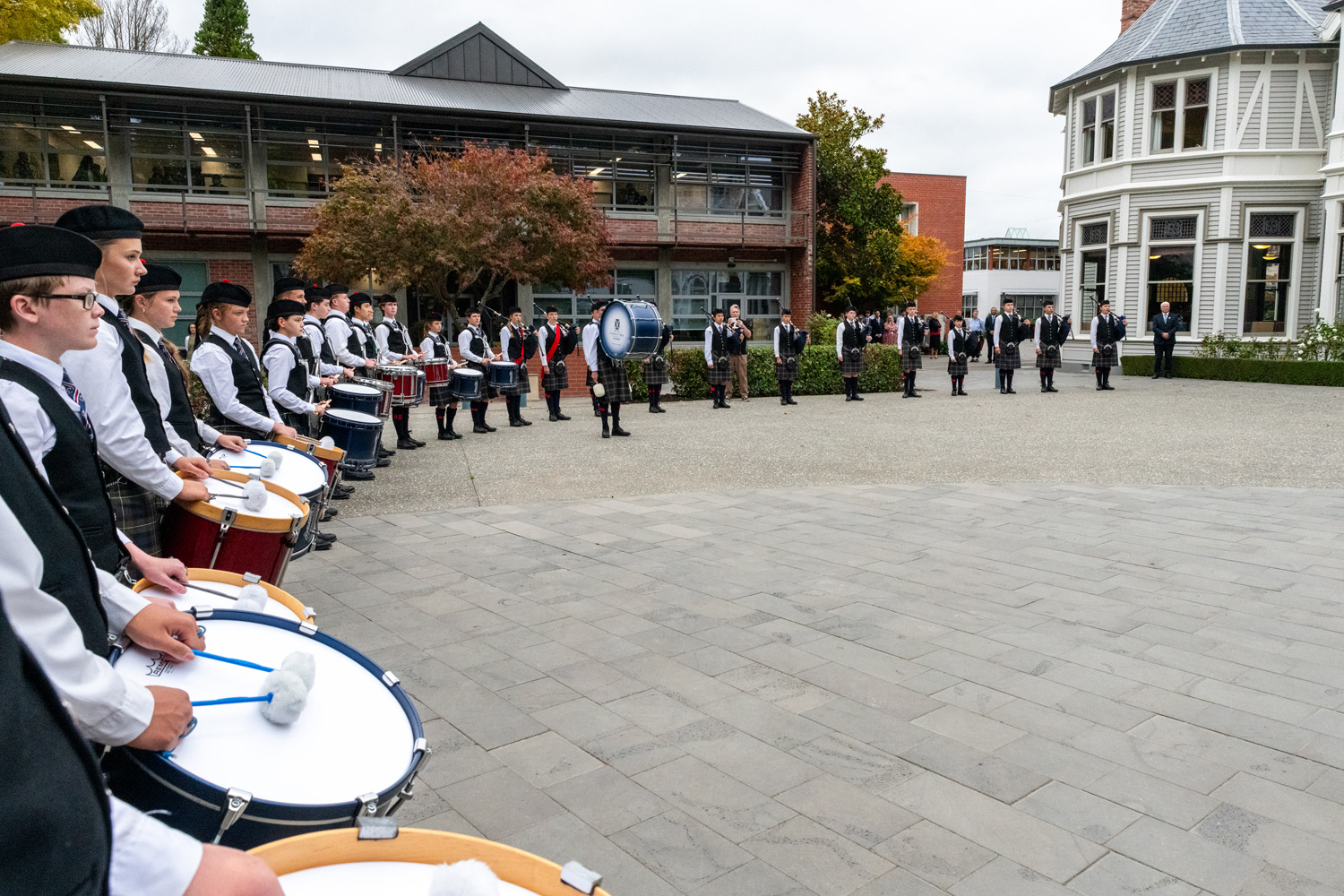 The Honourable Feleti Teo OBE (OC 1982), Prime Minister of Tuvalu, greeted by the St Andrew's College Pipe Band.