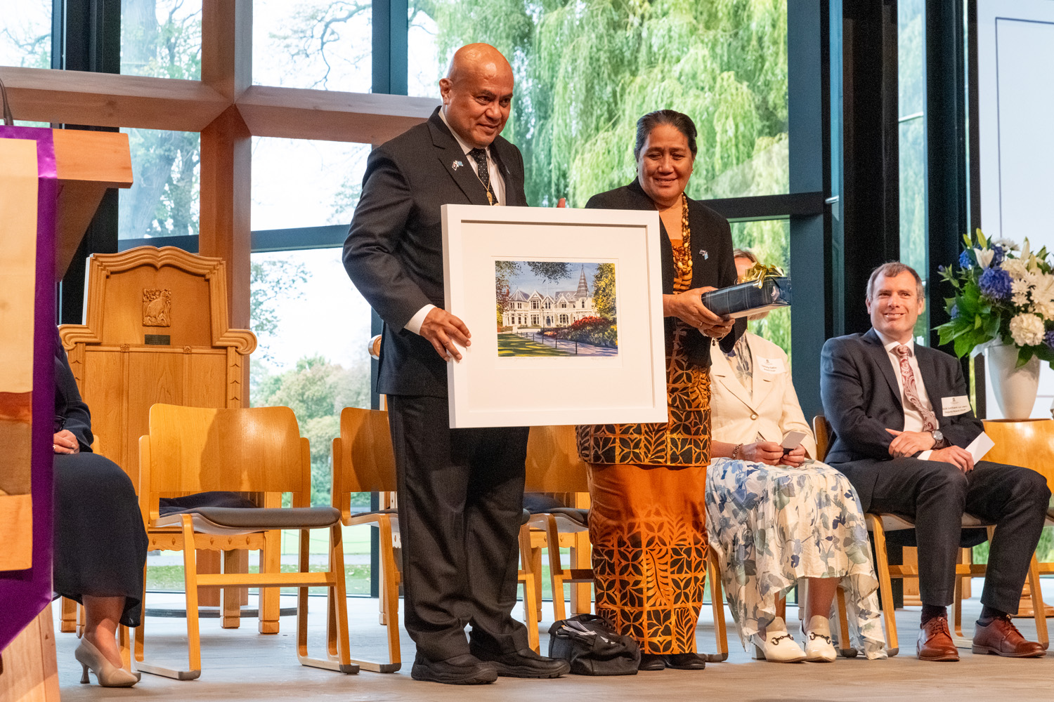 The Honourable Feleti Teo OBE (OC 1982), Prime Minister of Tuvalu, receiving a gift at St Andrew's College Centennial Chapel.