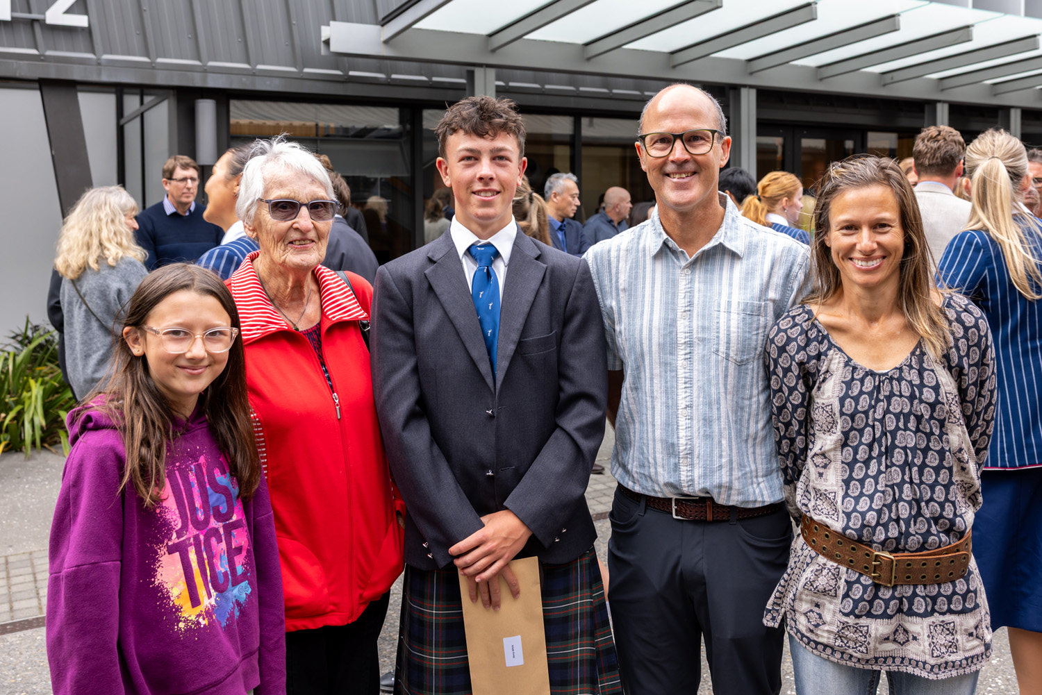 St Andrew's College student with his family at the 2026 Prefects’ Investiture and Leadership Assembly