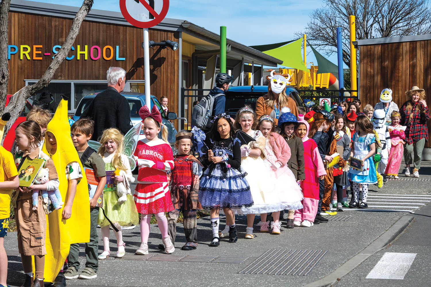 St Andrew's College Preparatory School students at the 2025 Book Week parade, walking in front of the Pre-school.