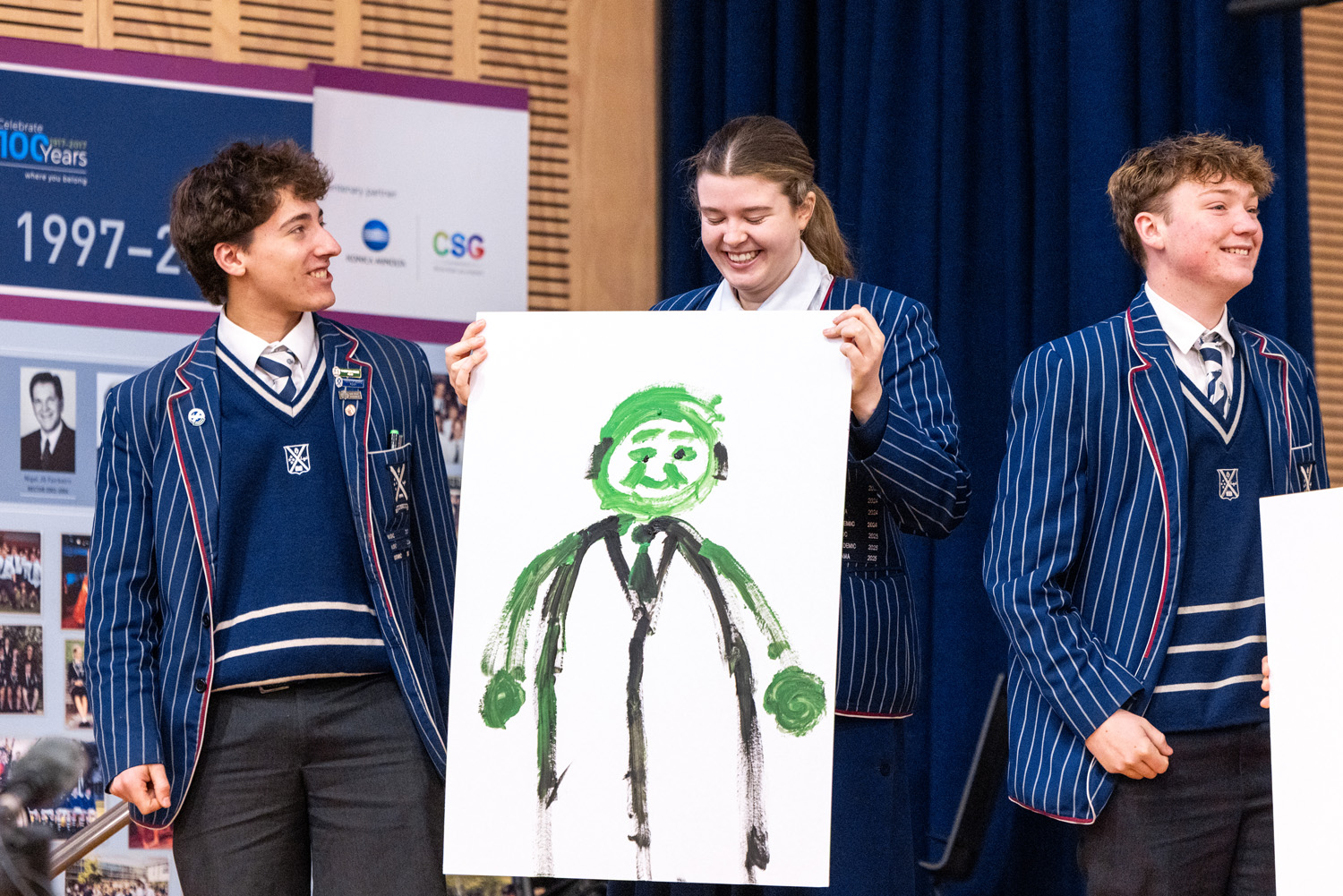 Students participating in a drawing challenge at the 2025 Cultural Assembly