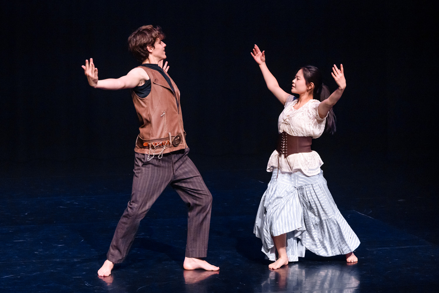 Two St Andrew's College students performing at Dance Revue 2025.