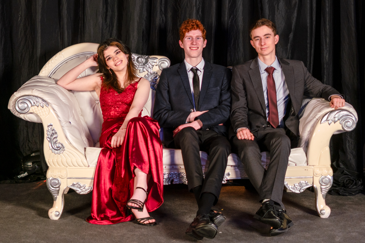 Three St Andrew's College students at the 2025 Senior College Formal.
