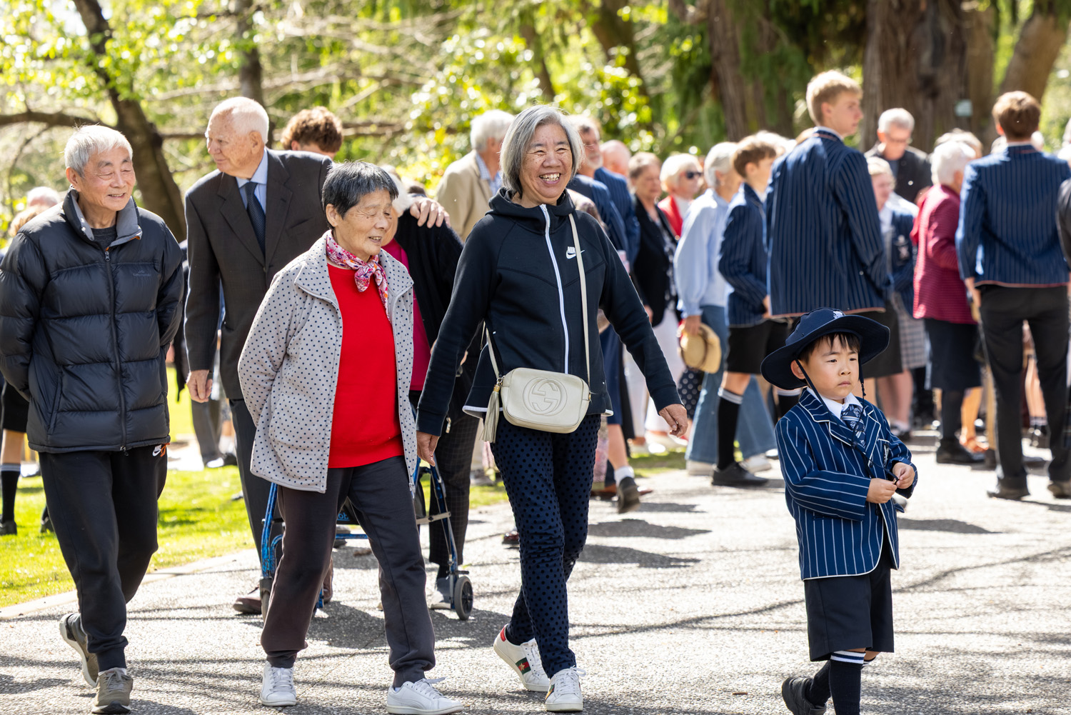 St Andrew's College students and grandparents walking around campus during Grandparents' Day 2025.