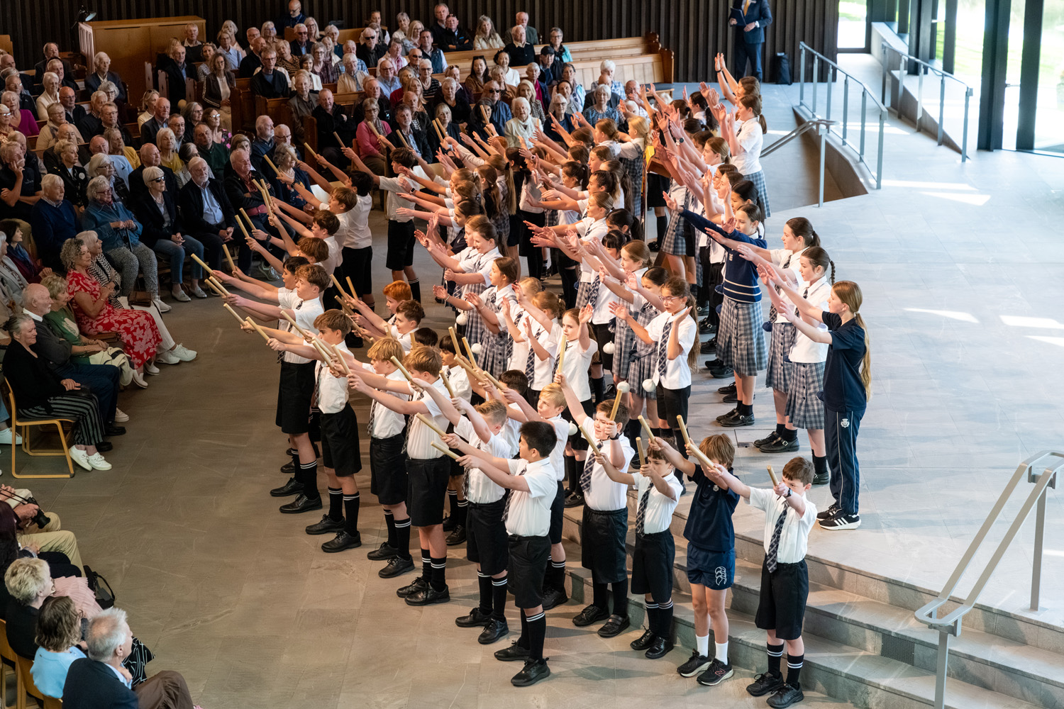 St Andrew's College students performing for grandparents in the Centennial Chapel during Grandparents' Day 2025.