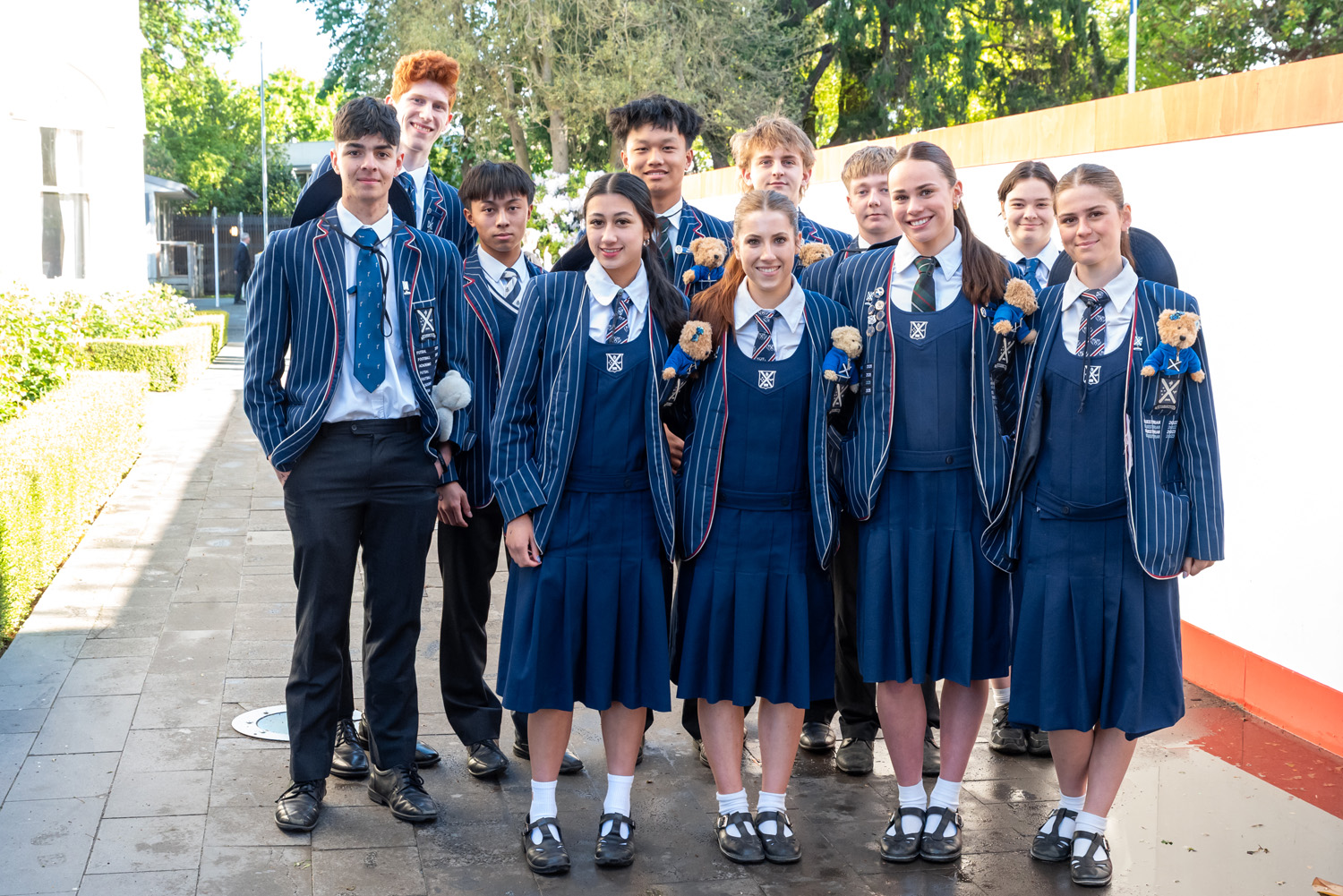 A group of St Andrew's College students before the 2025 Leavers' Assembly.