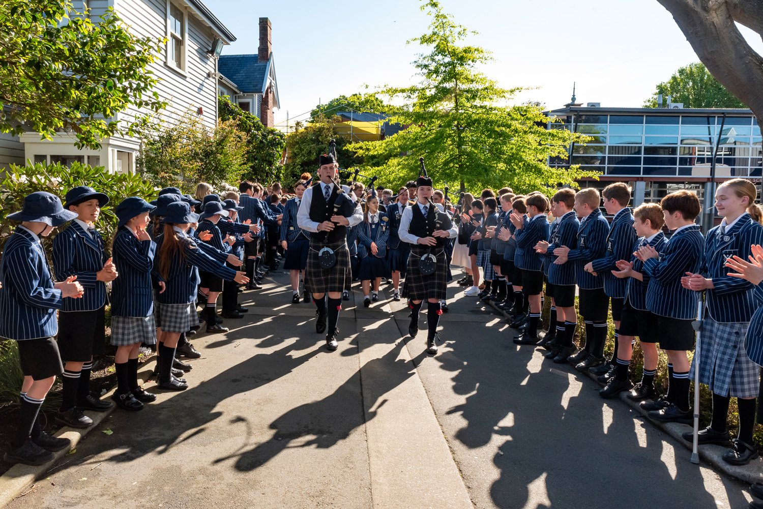 St Andrew's College students making their way to the Centennial Chapel through the campus for the 2025 Leavers' Assembly.