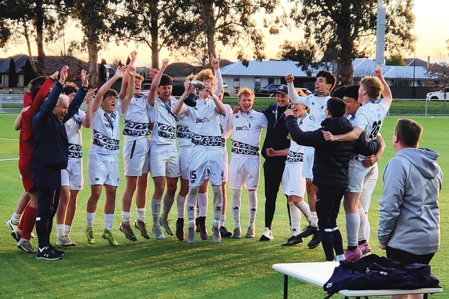 The St Andrew's College Boys&rsquo; 1st XI football team celebrating their national Division 2 title.