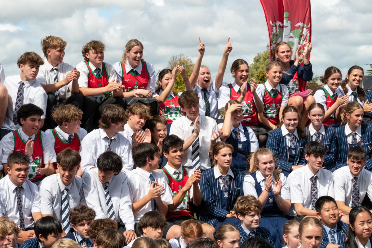 St Andrew's College students cheering happily at Athletic Sports Day.