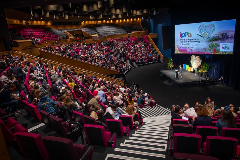 A speaker and their audience at the World Congress on Positive Psychology in Brisbane.