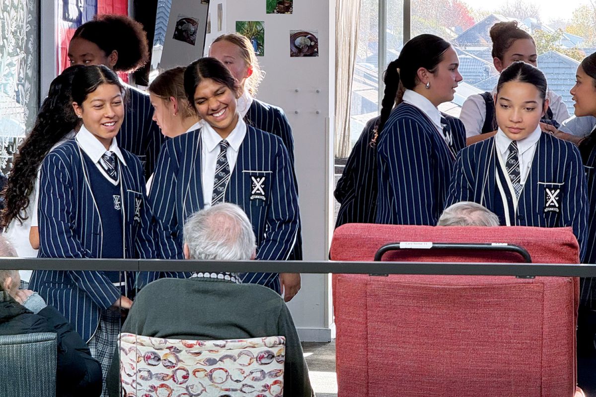 St Andrew's College Pasifika Group chatting with residents of the Merivale Retirement Village.