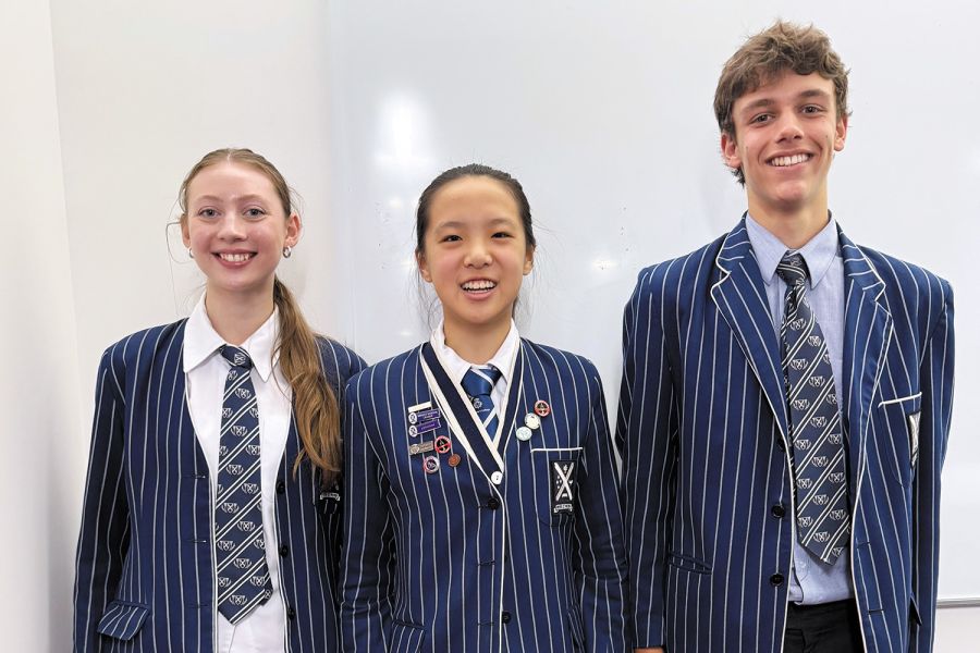 St Andrew's College students Gracie-Starr Guest, Hanxi (Cicy) Chen abd Lacjlan Hackston.