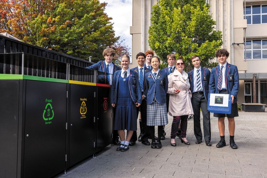 St Andrew's College Teacher-in-Charge of Sustainability Council, Ellen Hampson, with student Sustainability Council members at one of the new rubbish and recycling stations.
