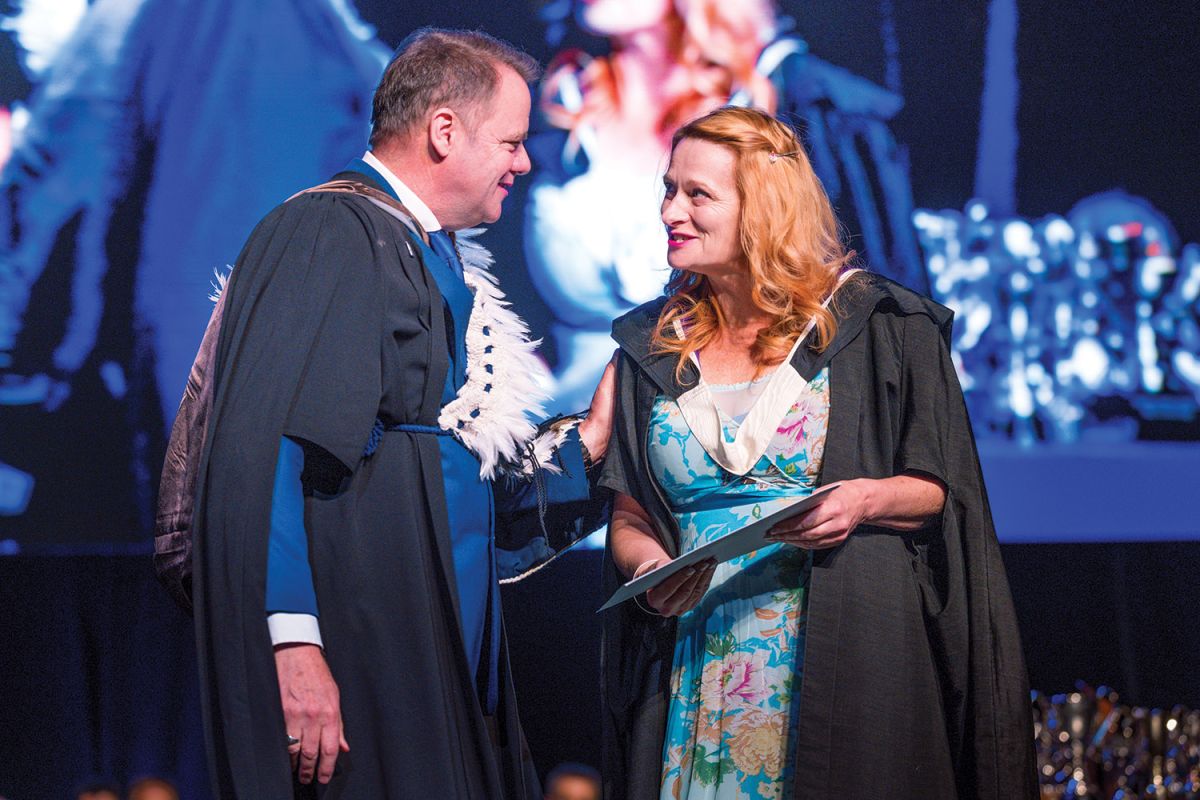 St Andrew's College Performing Arts Co-ordinator and Dance and Drama Teacher, Ginnie Thorner, receiving the Marily Scanlon Award from Rector, Mark Wilson.