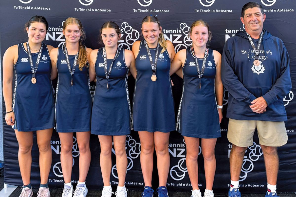 The St Andrew's College bronze medal winning Senior Girls’ tennis team with coach Hamish Faulls.