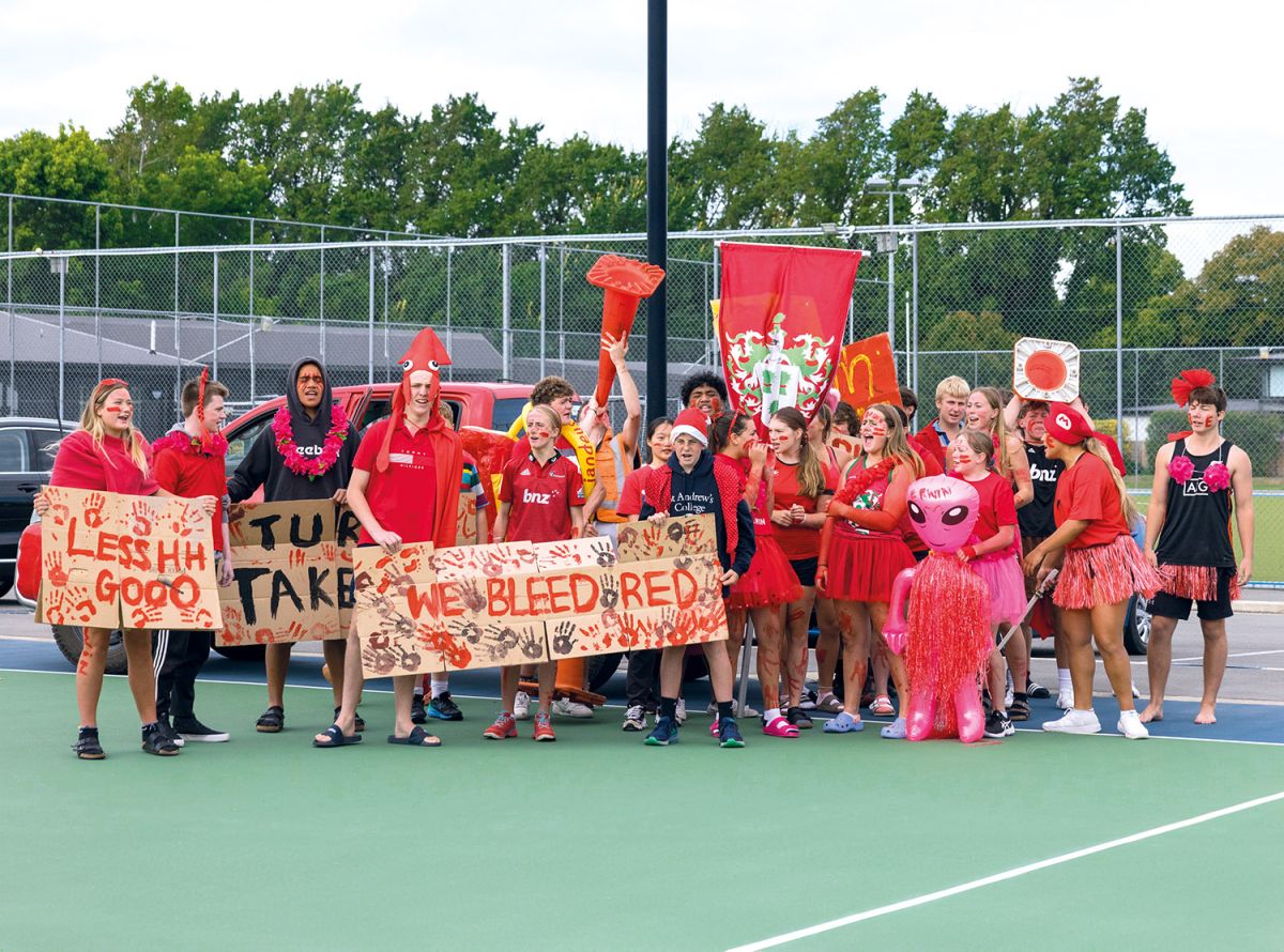 Erwin House boarding students dressed in the House colour, red.