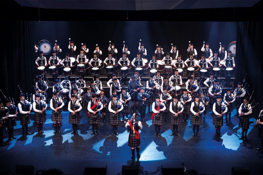 St Andrew's College Pipe Band performing at StAC Attack.