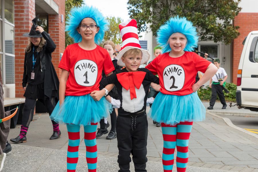 Three St Andrew's College Preparatory School students dressed as their favourite book characters during Te Wiki O Nga- Pukapuka – Book Week 2024.