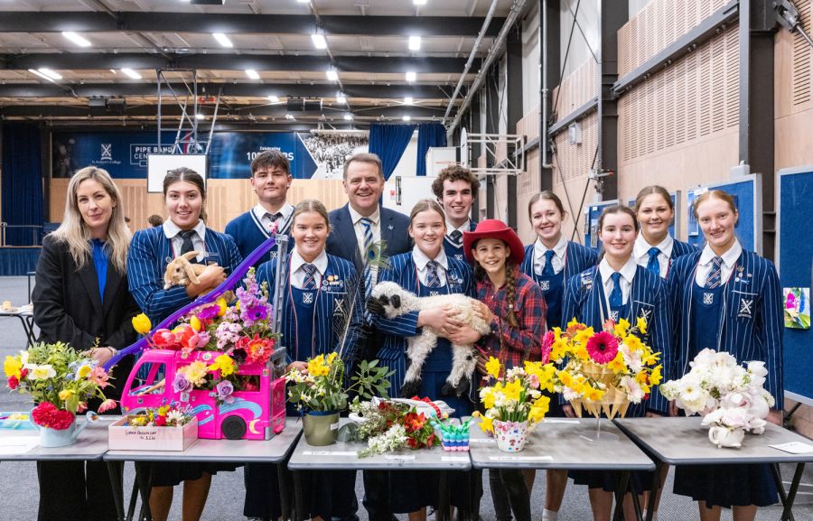 St Andrew's College Rector, Teacher in Charge of Agriculture, and students at the 2025 StAC Ag Show.