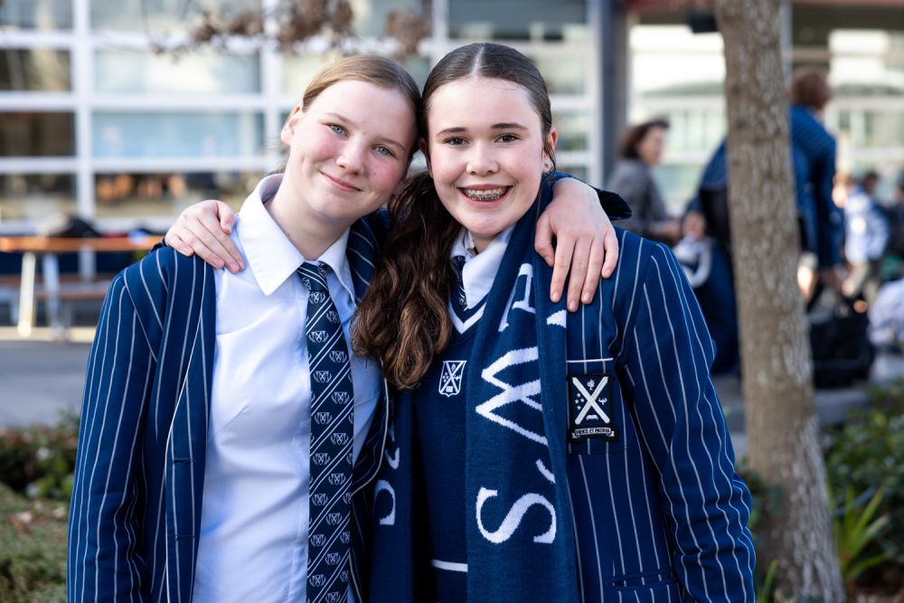 Two St Andrew's College students at the Quad during Well-being week.