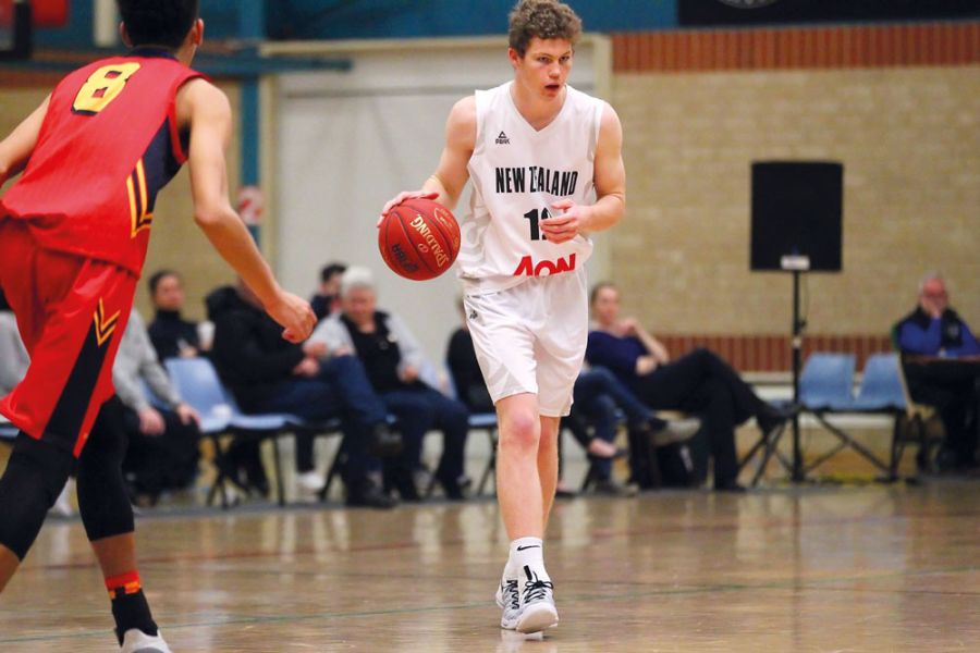 Mac Stodart (2019) playing basketball