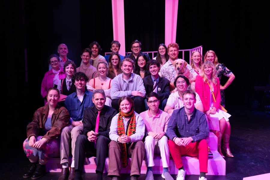 Old Collegians sitting on stage at opening event