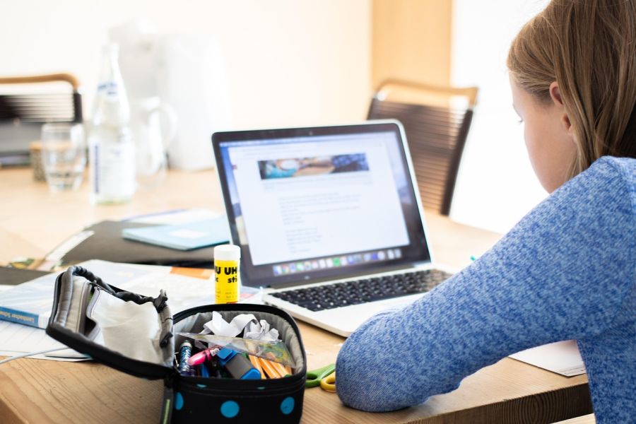 Girl learning online.