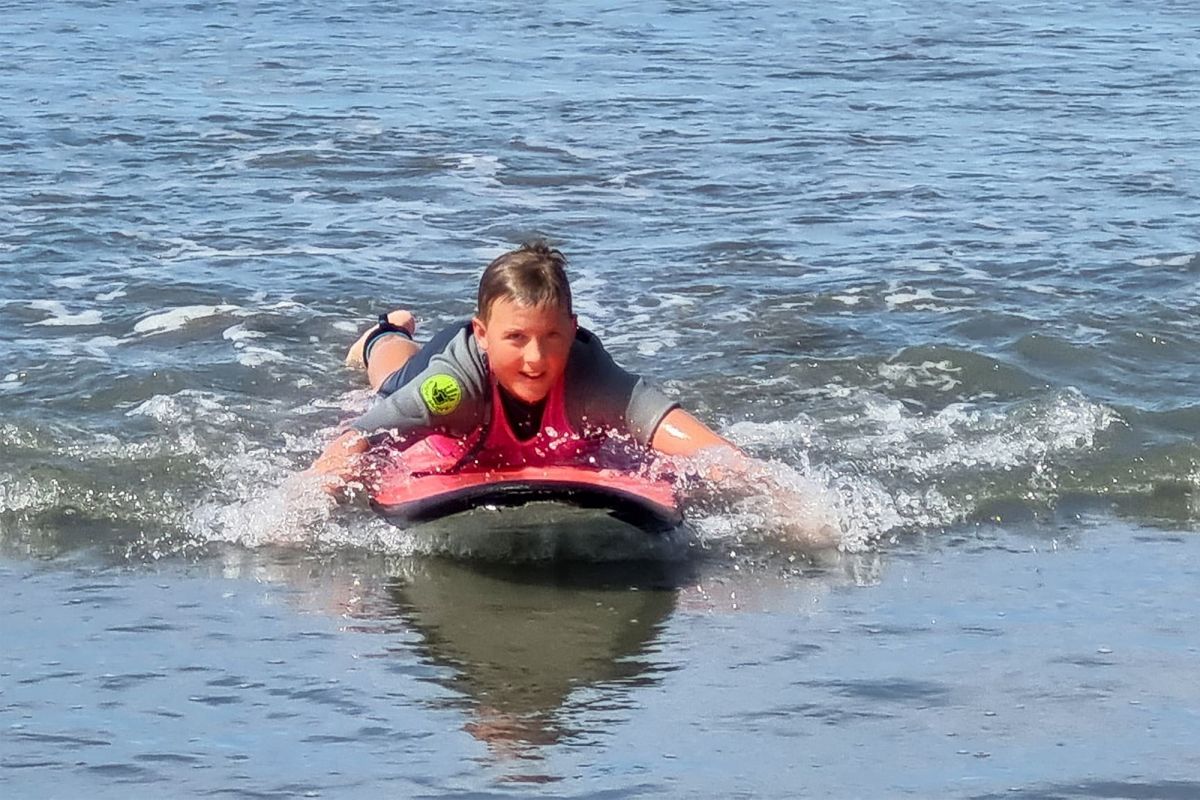 Boarding orientation day at the beach surfing.